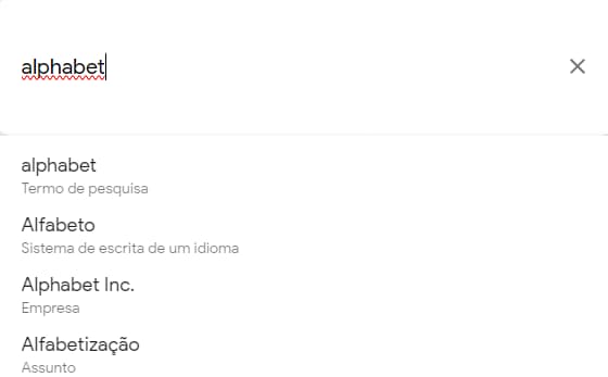 termo "alphabet no google trends, com linha para termo exato, alfabetização, e empresa alphabet